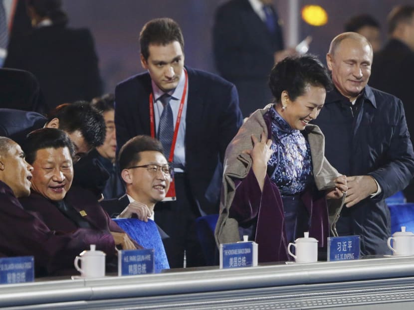 China censors wipe clip of Putin draping coat over Xi Jinping’s wife