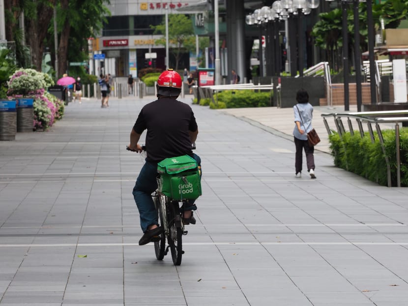 A food delivery rider on Orchard road on April 7, 2020.