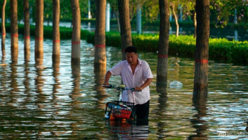Death toll from flooding in China's Henan province jumps to 302 Death toll from flooding in China's Henan province jumps to 302