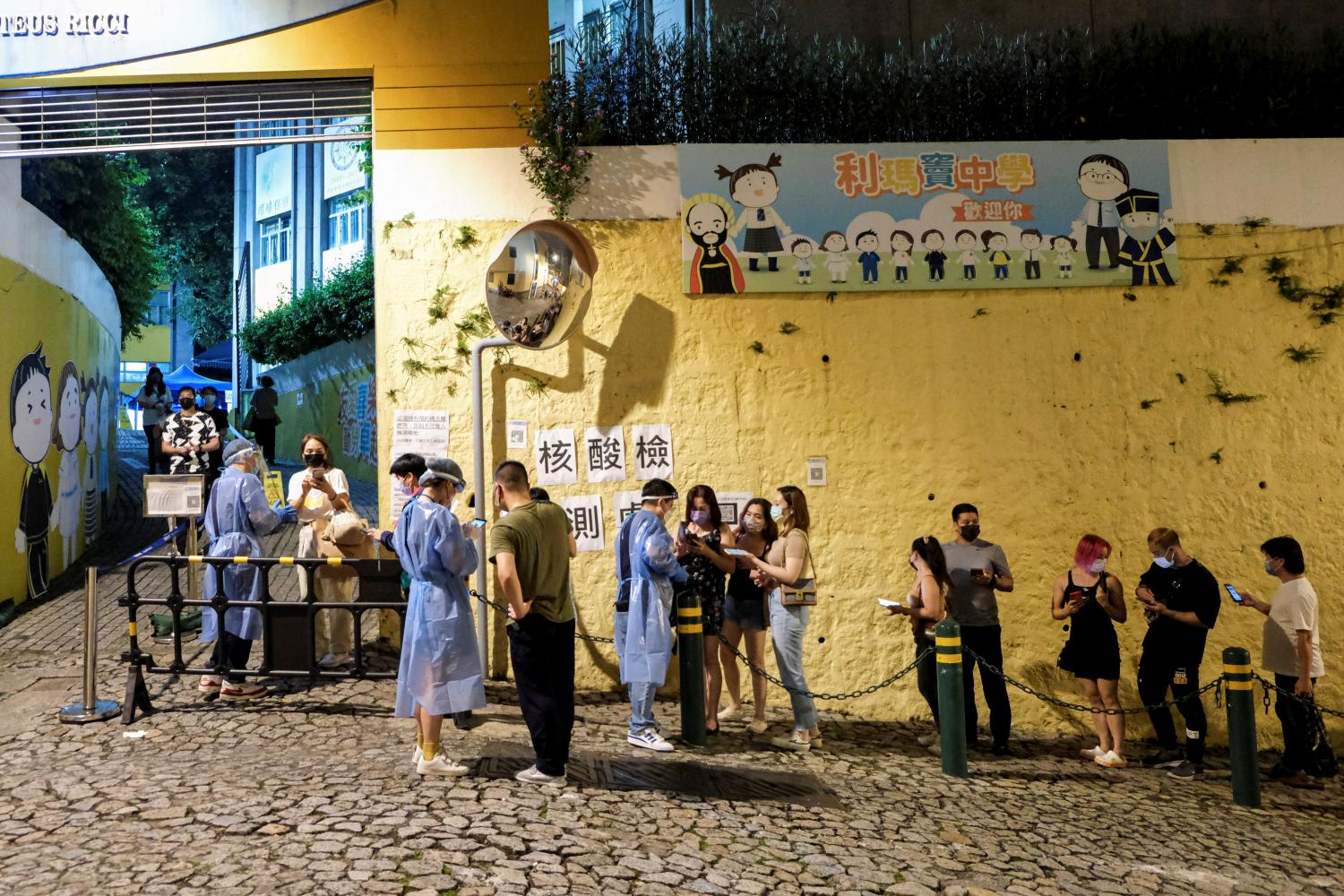 People queue for mass Covid-19 testing in Macau, China on June 19, 2022. People queue for mass Covid-19 testing in Macau, China on June 19, 2022.