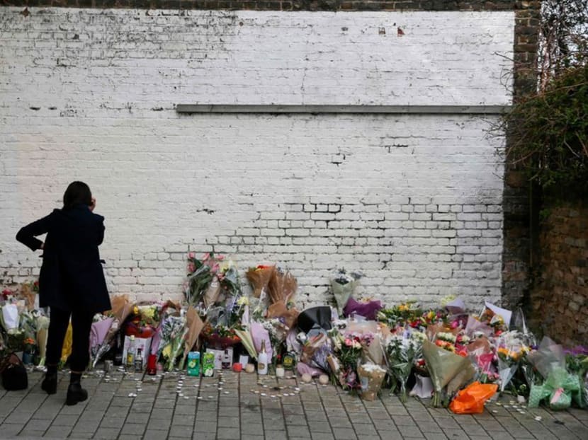 A memorial in Hackney, East London for Israel Ogunsola, 18, who was stabbed to death on Wednesday.