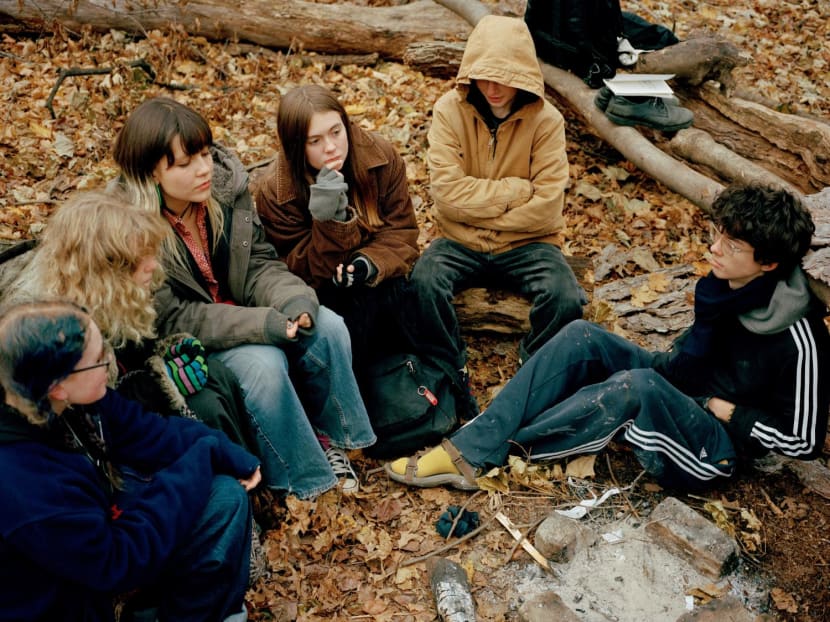 Students Clementine Karlin-Pustilnik (left to right), Odille Zexter-Kaiser, Jameson Butler, Logan Lane, Yona Ehrlich and Max Frackman at a weekly meeting of the Luddite Club in Prospect Park in Brooklyn on Dec 11, 2022.