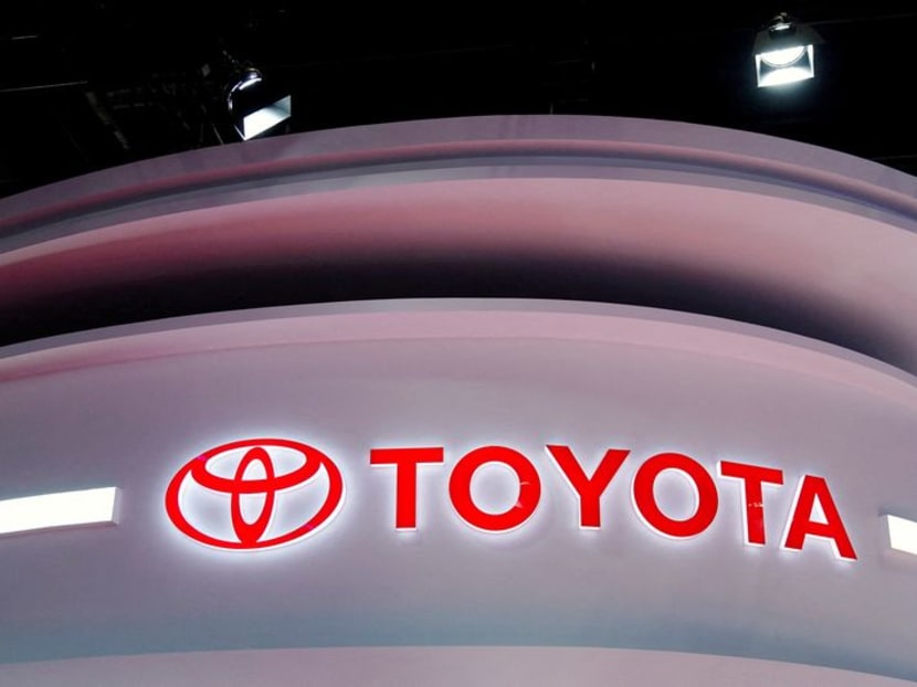 FILE PHOTO: The Toyota logo is seen at its booth during a media day for the Auto Shanghai show in Shanghai, China April 19, 2021. REUTERS/Aly Song