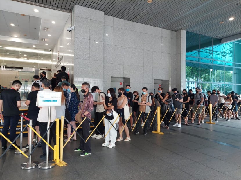'I have a backache now': People wait for hours to collect passports at ICA building 'I have a backache now': People wait for hours to collect passports at ICA building