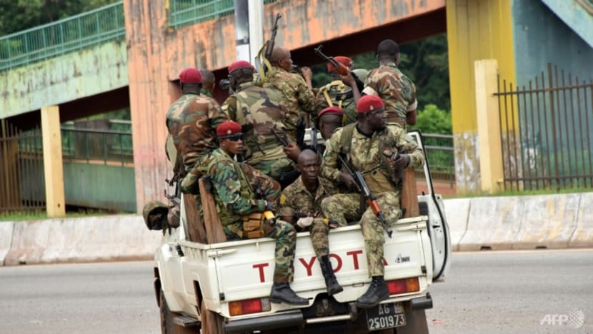 Army seizes power in Guinea, holds president Army seizes power in Guinea, holds president