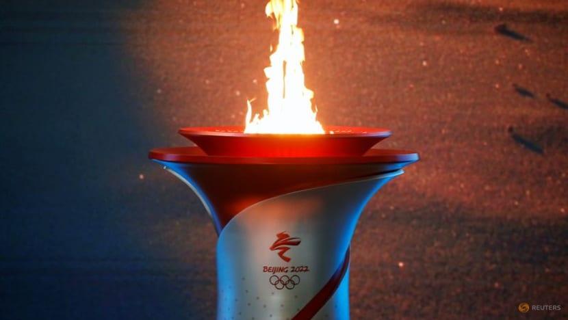 Beijing lights flame, to be first city to host summer, winter games Beijing lights flame, to be first city to host summer, winter games