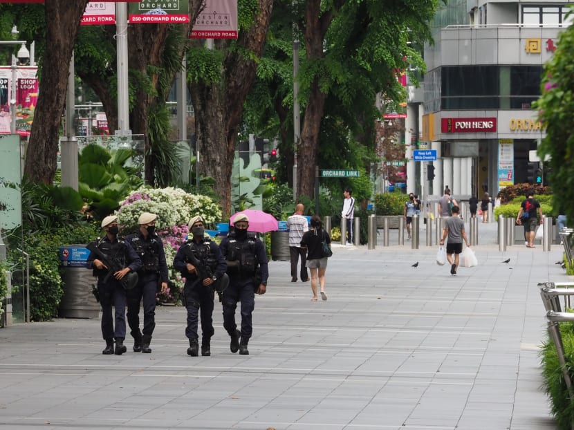 Security officers patrolling along Orchard Road. The authorities said that the Jemaah Islamiyah terrorist group that had plotted attacks in Singapore two decades ago remains a latent threat.