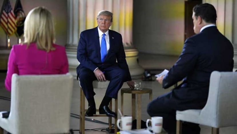 Trump says up to 100,000 Americans may die from COVID-19 Trump says up to 100,000 Americans may die from COVID-19