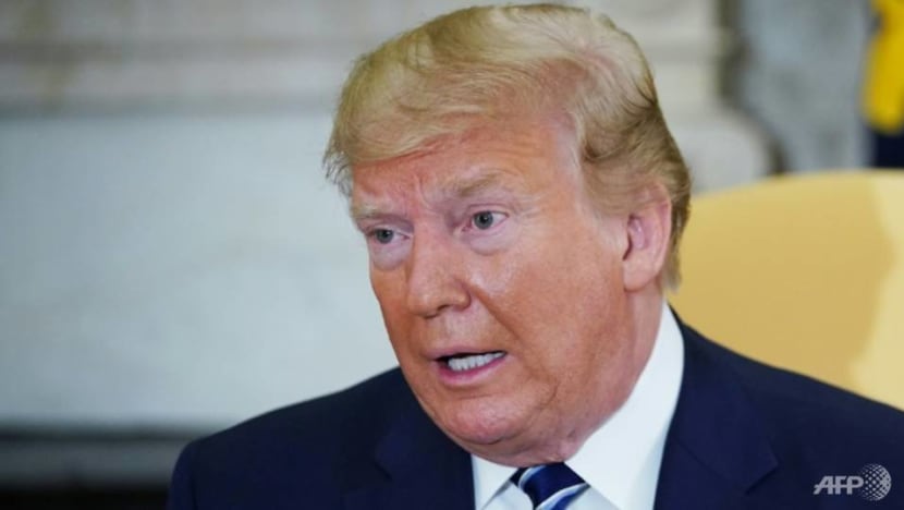 Trump warns of 'overwhelming' retaliation to any Iranian attack