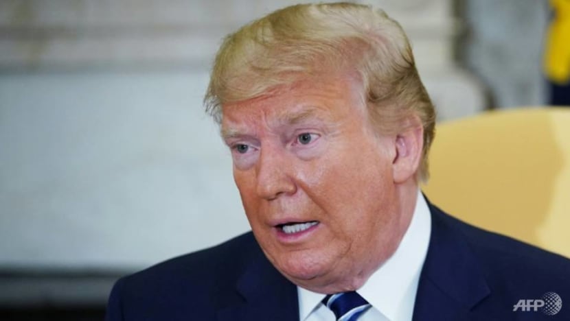 Trump warns of 'overwhelming' retaliation to any Iranian attack Trump warns of 'overwhelming' retaliation to any Iranian attack
