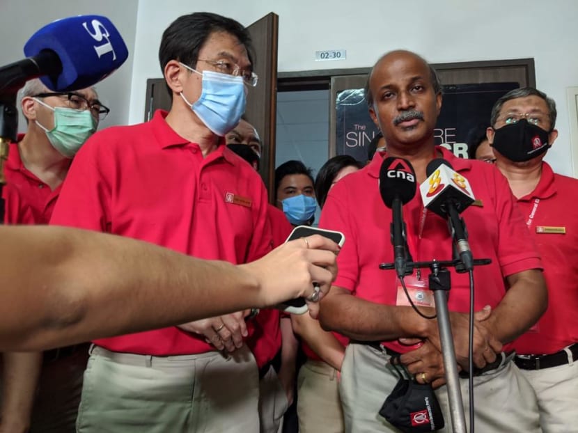 Dr Chee Soon Juan (second from left) and Dr Paul Tambyah (second from right) of the Singapore Democratic Party.