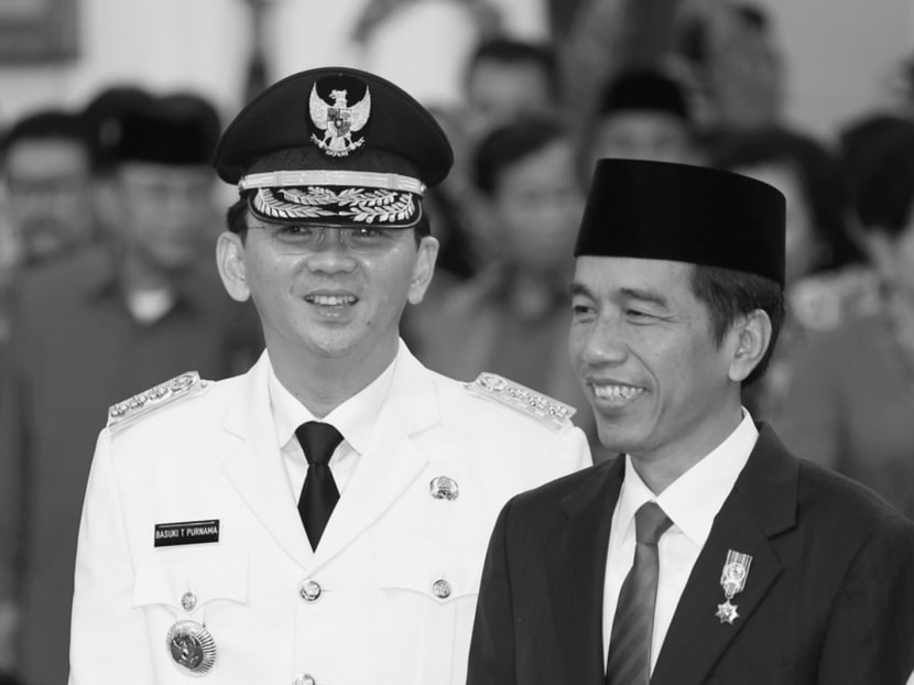 The governor of Jakarta, Mr  Basuki Tjahaja Purnama (left), who is ethnically Chinese, with Indonesian President Joko Widodo. The liberalised political climate since 1998 has allowed Chinese Indonesians to become much more active in politics, and they have taken office as parliamentarians, regents, mayors and governors. Photo: Reuters
