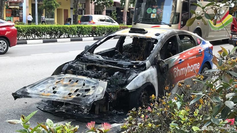 Taxi bursts into flames along Middle Road Taxi bursts into flames along Middle Road
