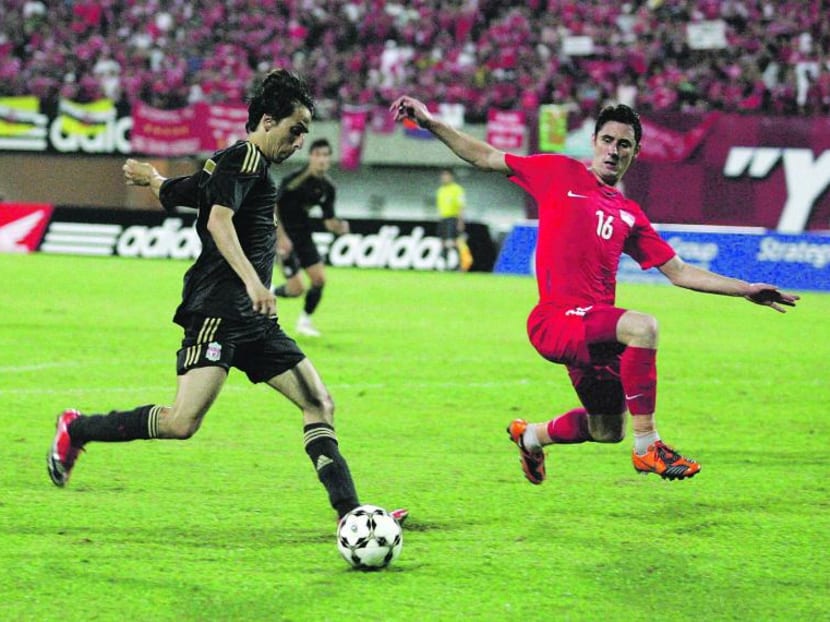 Liverpool's Yossi Benayoun taking on Singapore's Daniel Bennett during the 2009 Merlion Cup. The invitational tournament was discontinued after that year's edition. TODAY file photo