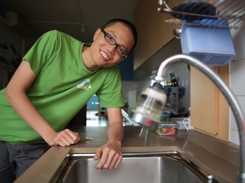 Mr Tan Yi Han (above), environmental advocate and co-founder of non-governmental organisation People’s Movement to Stop Haze, with a faucet fitted with a thimble (below) that regulates water pressure at home to help save water. Photo: Jason Quah
