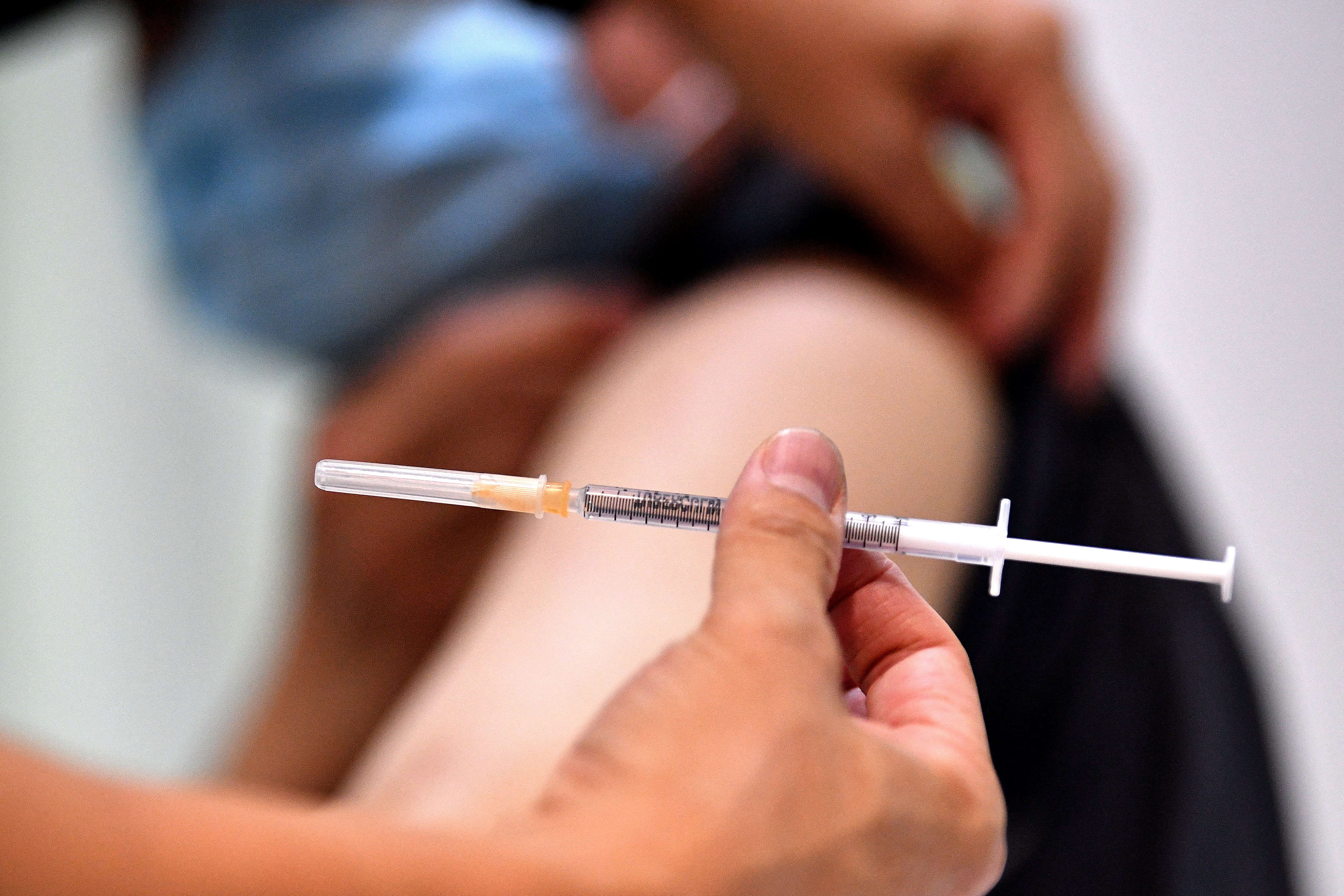 Australians told to get Covid boosters to be considered fully vaccinated