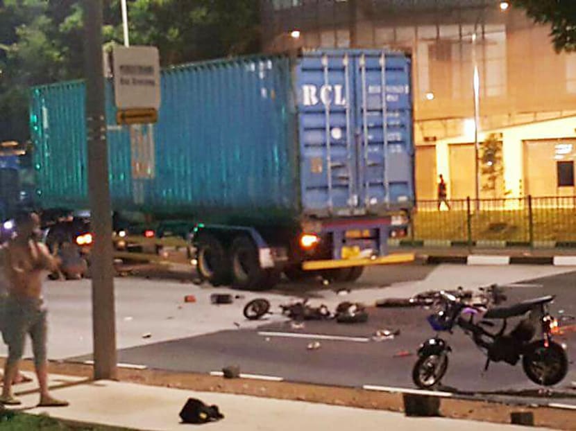 A road accident that took place at the junction of West Coast Highway and Pandan Crescent left two men dead, and one injured. Photo: Eric Ang/Facebook