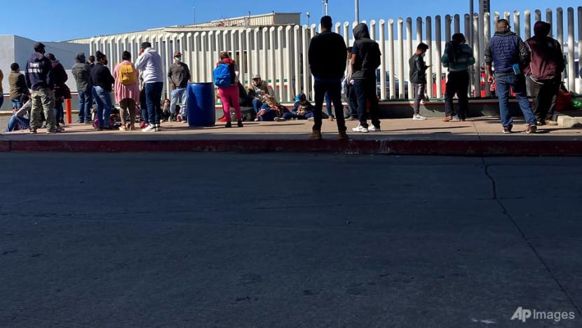 US begins admitting asylum seekers blocked by Trump, with thousands more waiting