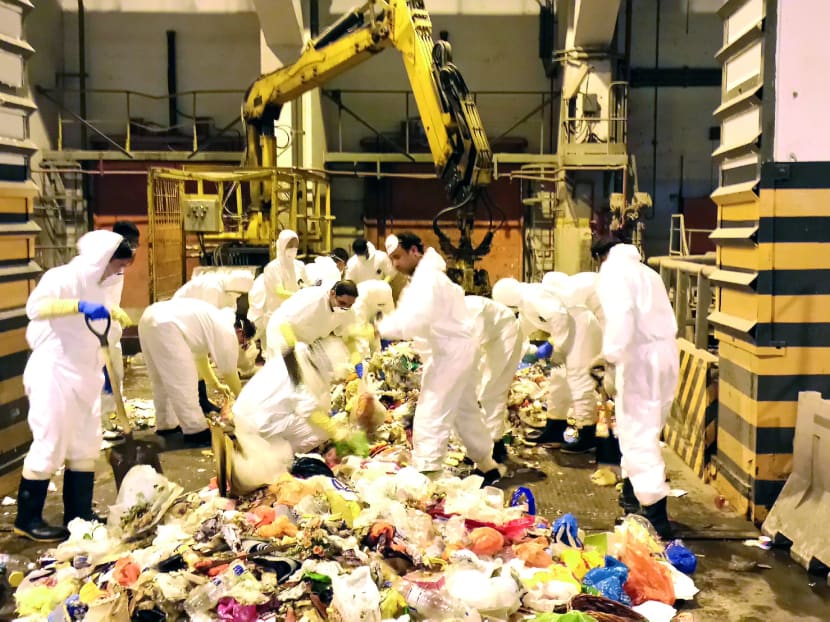 Investigators searched the Tuas South Incineration Plant immediately after the body was found but did not find the missing body parts. Photo: SPF