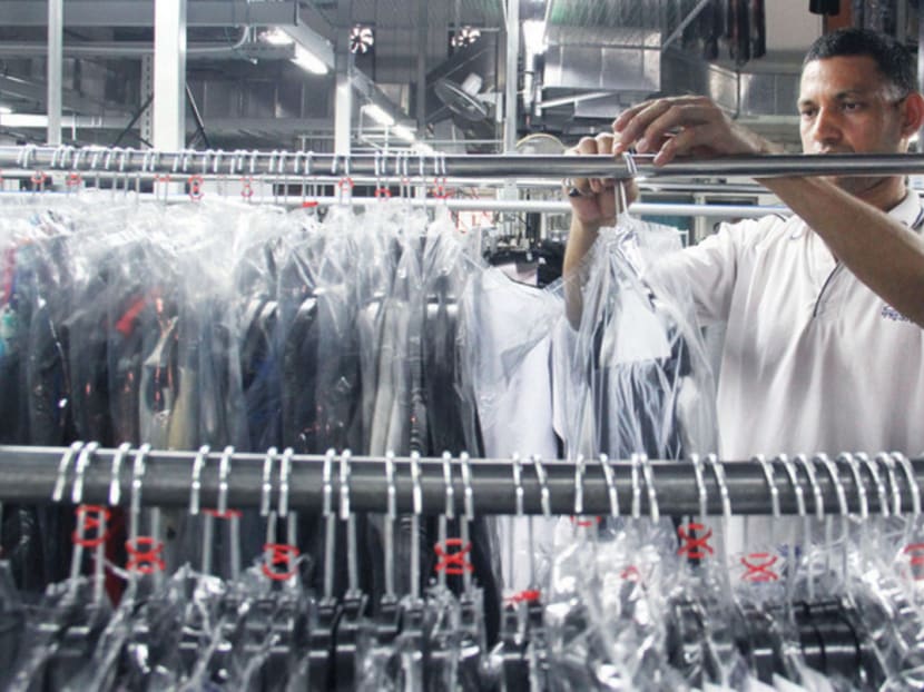 A worker at Presto Drycleaners production plant. TODAY FILE PHOTO