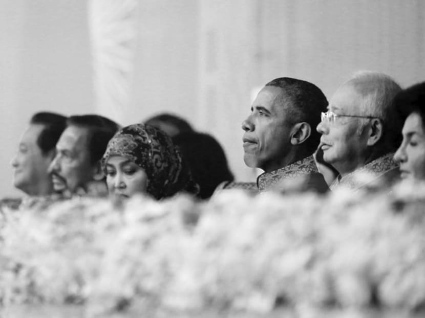 US President Barack Obama sitting with Malaysian Prime Minister Najib Razak (second from right) at the ASEAN Summit gala dinner in Malaysia on Nov  21, 2015. If Washington can truly support ASEAN as the hub for the wider region, a greater sense of participation and less conflict could result. Photo: Reuters
