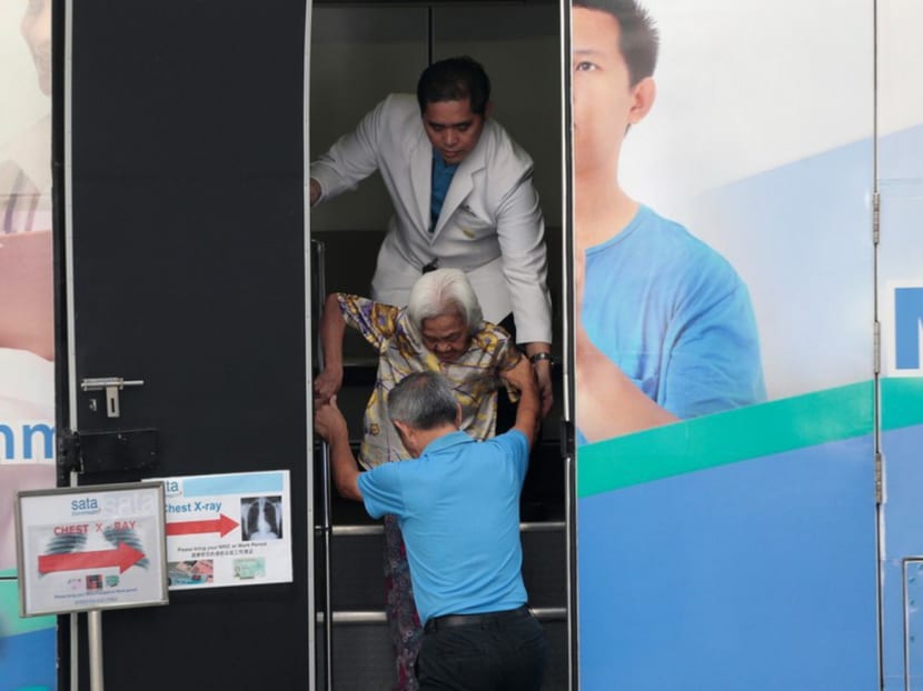Residents and former residents of Blk 203, Ang Mo Kio Ave 3, get screened for TB. Photo: Jason Quah/TODAY