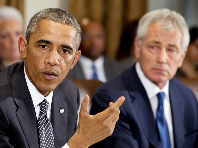 Mr Hagel (right) struck a friendship with Mr Obama when they were both critics of the Iraq war, but has had trouble penetrating the tight team of the President’s closely knit set of loyalists. Photo: AP