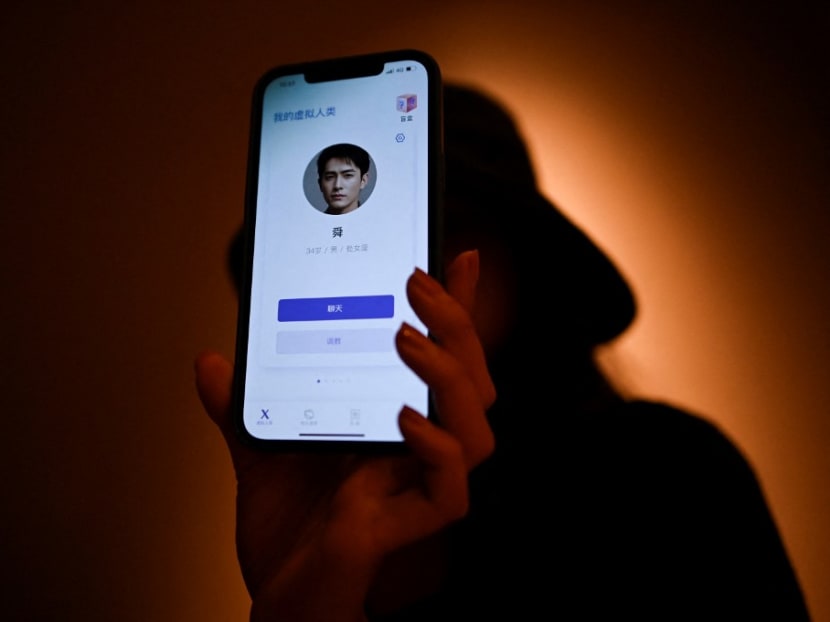 This picture taken on July 16, 2021 shows Melissa showing her virtual boyfriend — a chatbot created by XiaoIce, a cutting-edge artificial intelligence system designed to create emotional bonds with its user — on her mobile phone in Beijing.