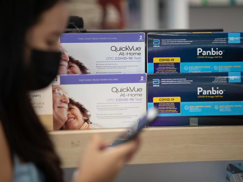 Covid-19 antigen self-test kits on sale at a pharmacy. Covid-19 antigen self-test kits on sale at a pharmacy.