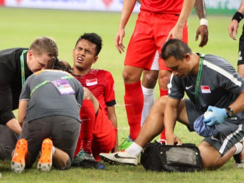Singapore player Shahdan Sulaiman after he was injured in the AFF Suzuki Cup match against Myanmar yesterday. Photo: Xabryna Kek/Channel NewsAsia