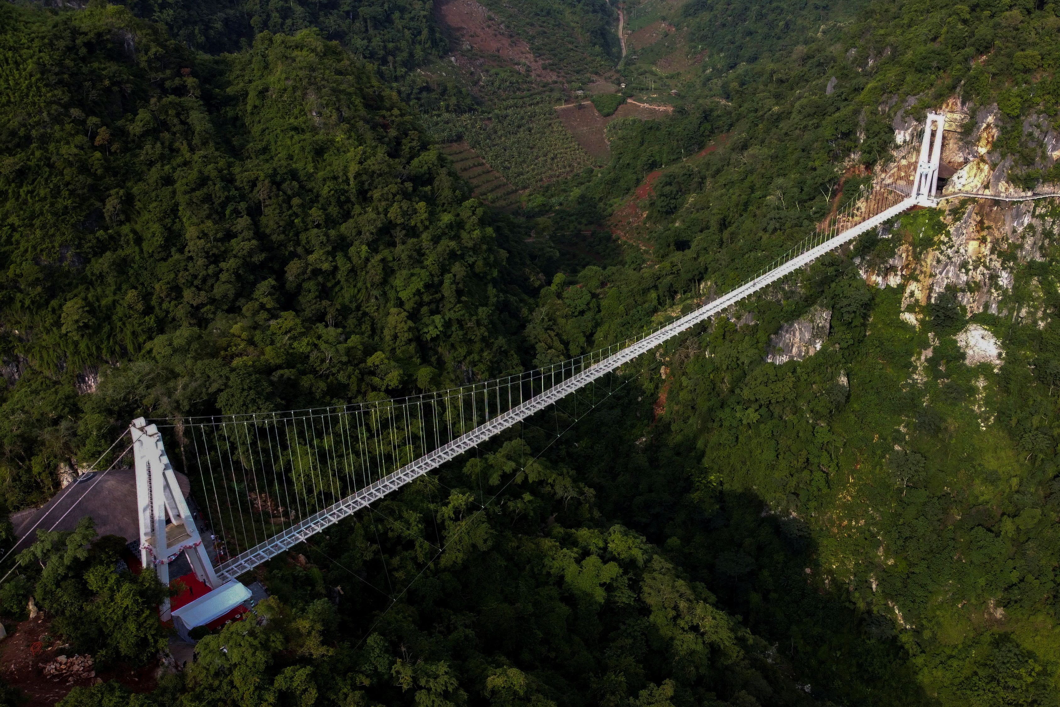 An aerial view of the Bach Long glass bridge at Moc Chau district in Son La province, Vietnam on May 28, 2022. 