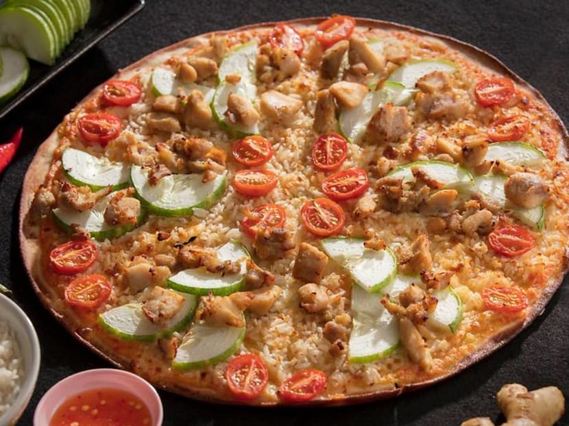 Pezzo Pizza offering Hainanese chicken rice and satay flavours