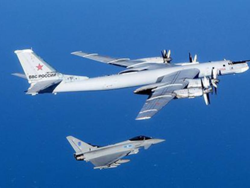 A British fighter intercepting a Russian Tu-95 bomber as it flew across one of the busiest civilian flight paths in Europe. Photo: Royal Air Force