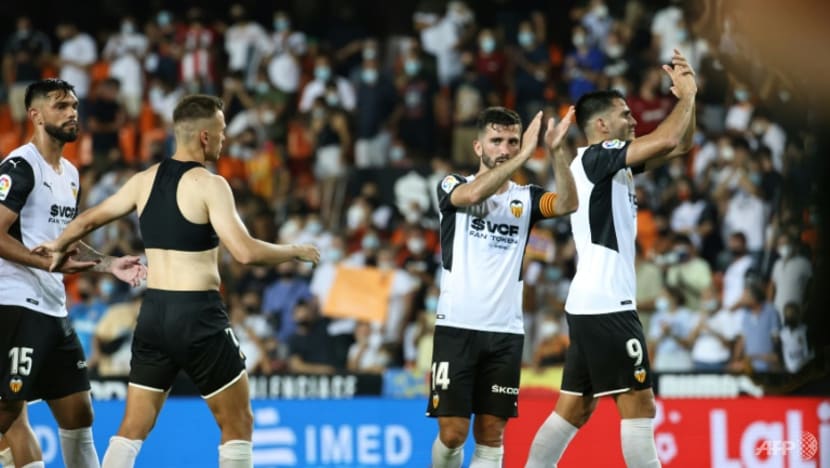 Football: Valencia overcome third-minute red card to beat Getafe in season-opener