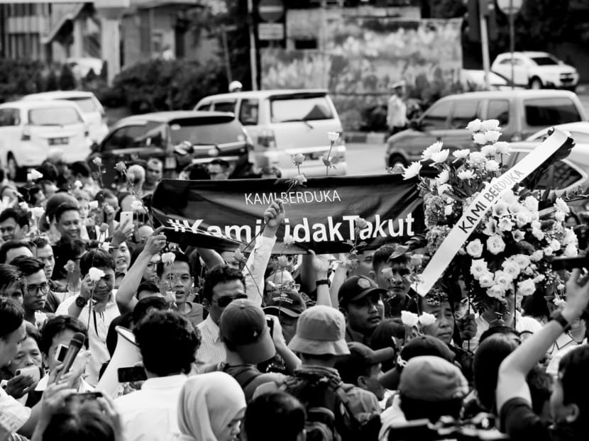 After the Jakarta attacks last January, the hashtag #KamiTidakTakut (“We are not afraid”) went viral. If a terror attack occurs, Singaporeans have to come up with a grassroots event and response. Photo: Reuters