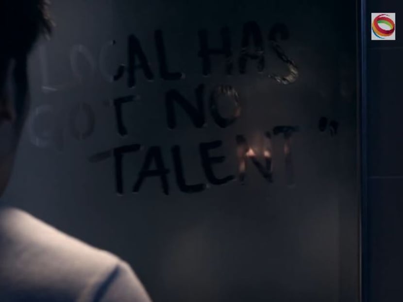 A screengrab from the video where an athlete is confronted with the words "Local has got no talent".