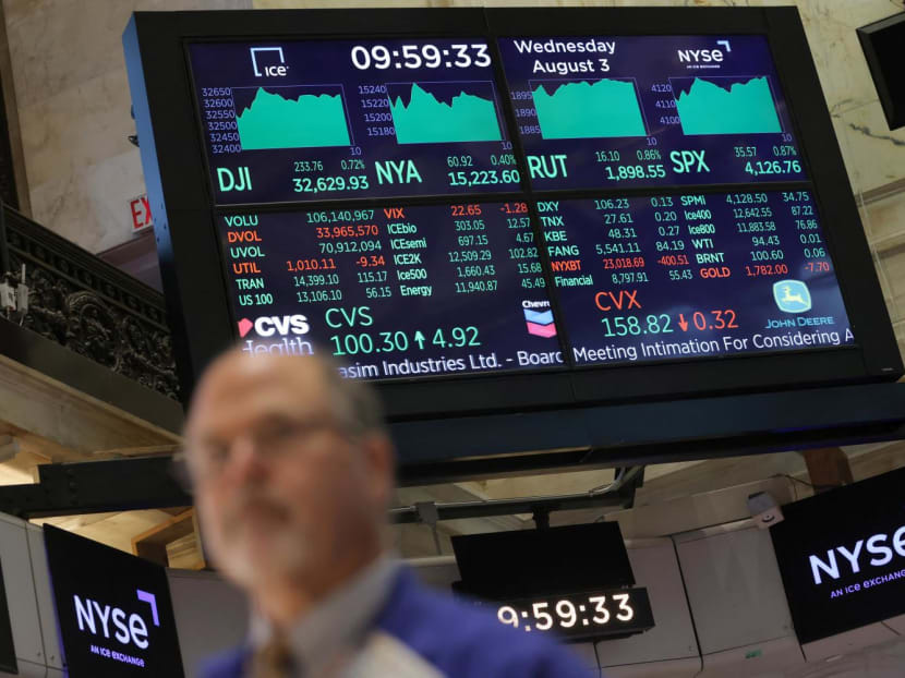 A screen displays market information on the trading floor at the New York Stock Exchange in New York on Aug 3, 2022.