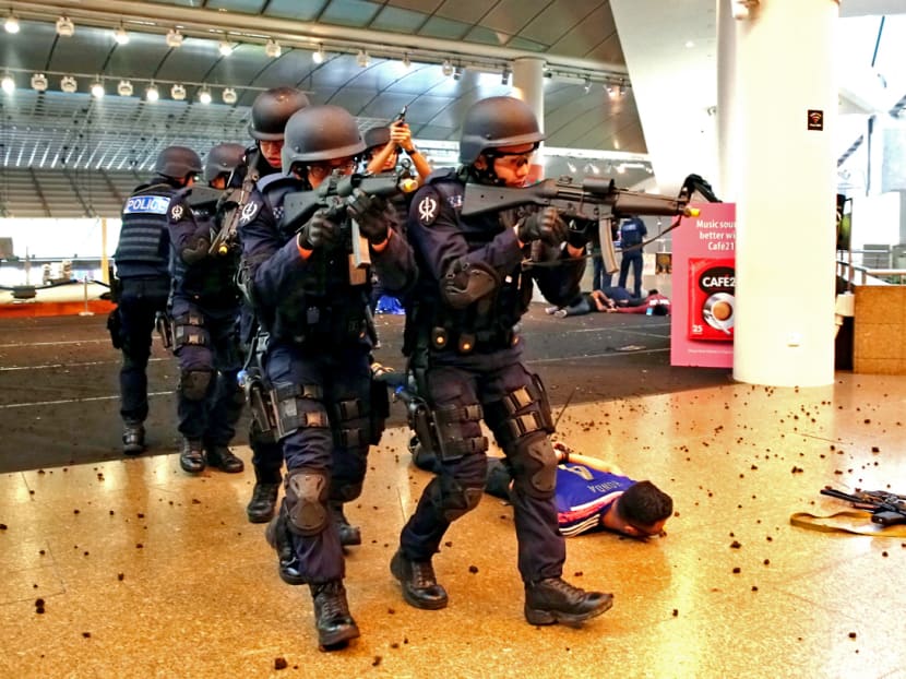 Participants respond to a simulated scenario of an explosion and evacuation during an attack by gunmen for an emergency preparedness exercise at Esplanade-Theatres on the Bay in 2016.  The author says that during a terror incident, accurate information will be in high demand but not necessarily forthcoming, and misinformation can adversely impact the management of an ongoing crisis.  TODAY file photo