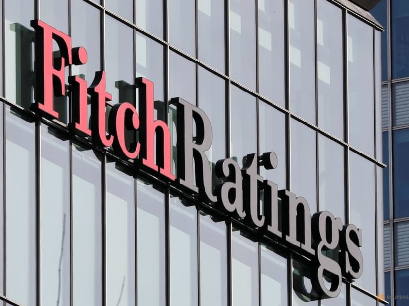 FILE PHOTO: The Fitch Ratings logo is seen at their offices at Canary Wharf financial district in London,Britain, March 3, 2016. REUTERS/Reinhard Krause FILE PHOTO: The Fitch Ratings logo is seen at their offices at Canary Wharf financial district in London,Britain, March 3, 2016. REUTERS/Reinhard Krause