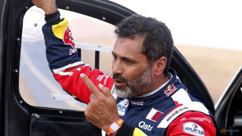 Qatar's Al-Attiyah takes Dakar lead as Sainz hits trouble Qatar's Al-Attiyah takes Dakar lead as Sainz hits trouble