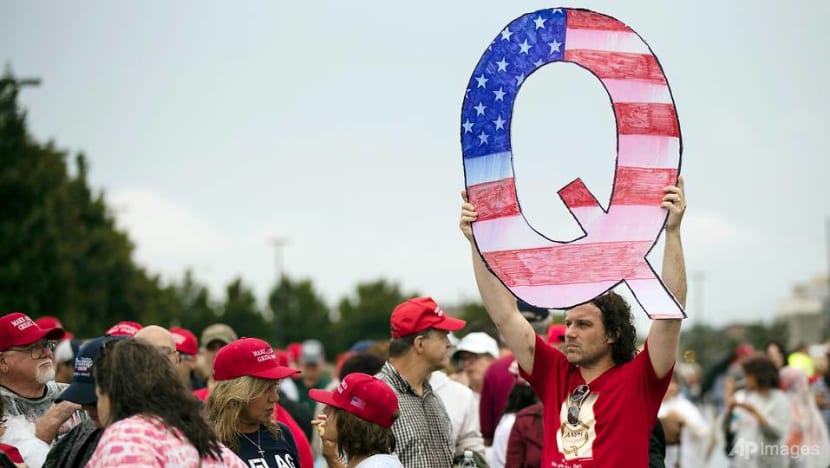 Commentary: QAnon – how a conspiracy-consuming community persists, despite its leader going MIA