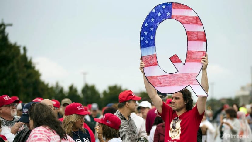 Facebook, Twitter flounder in QAnon crackdown