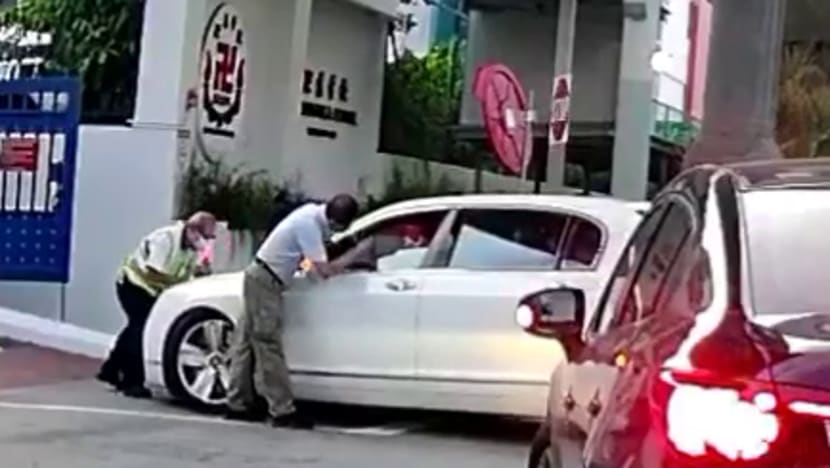MOE looking into case of driver seen pushing back security officer with his car at Red Swastika School MOE looking into case of driver seen pushing back security officer with his car at Red Swastika School