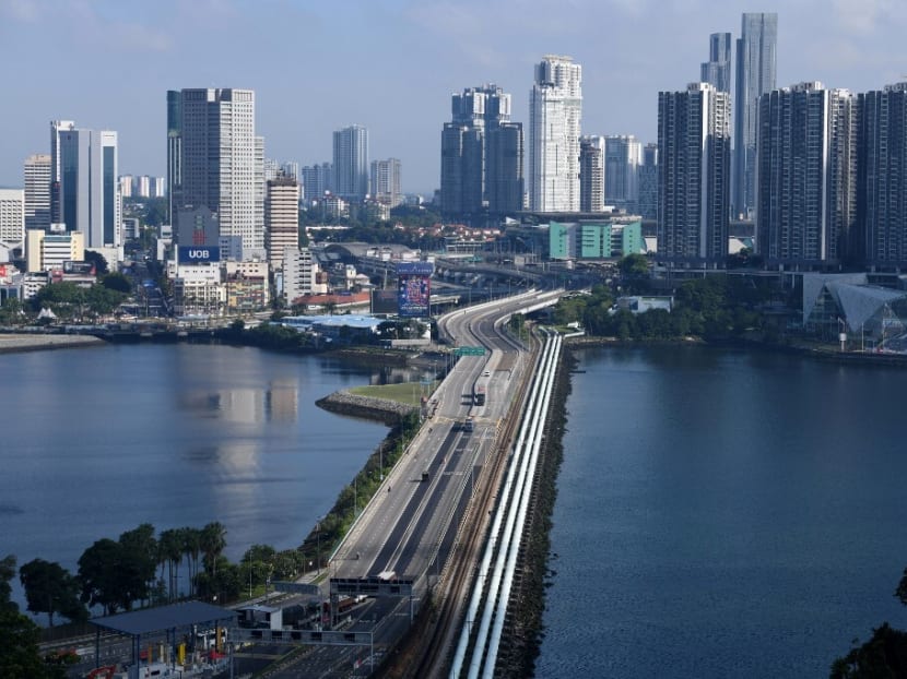 A view of the Causeway linking Singapore and Malaysia. A view of the Causeway linking Singapore and Malaysia.
