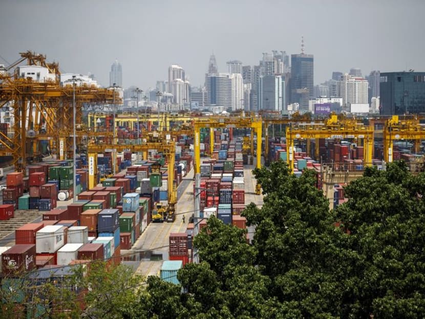FILE PHOTO: Shipping containers stand at a port in Bangkok March 30, 2015. REUTERS/Athit Perawongmetha/File Photo