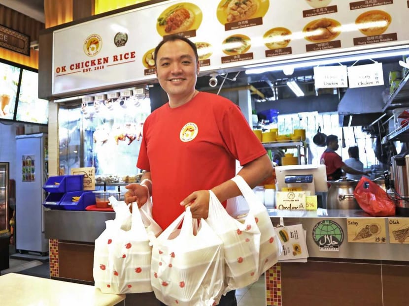 Mr Daniel Tan, owner of OK Chicken Rice in Ang Mo Kio, who, with his wife Madam Clara Loh, are giving hundreds of packets of free chicken rice to hospital staff and nurses.