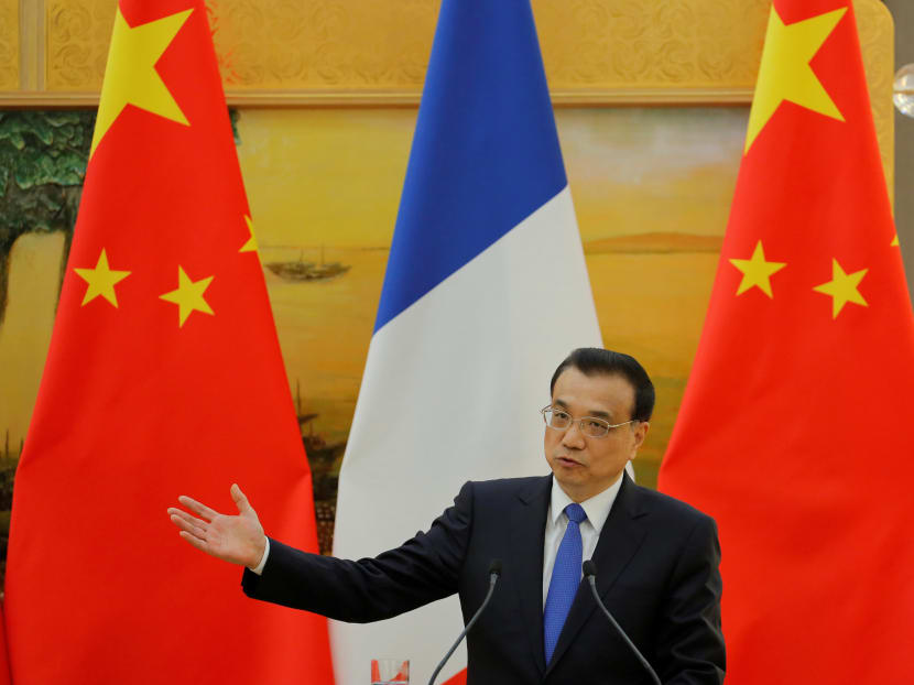 Chinese Premier Li Keqiang gestures during a joint press conference held with French Prime Minister Bernard Cazeneuve (not pictured) at the Great Hall of the People in Beijing, China, Feb 21, 2017. Photo: Reuters