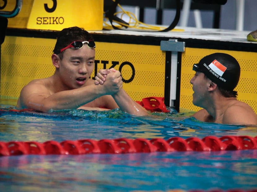 Francis Fong and Quah Zheng Wen congratulate each other after the 200m backstroke final. Photo: Jason Quah/TODAY