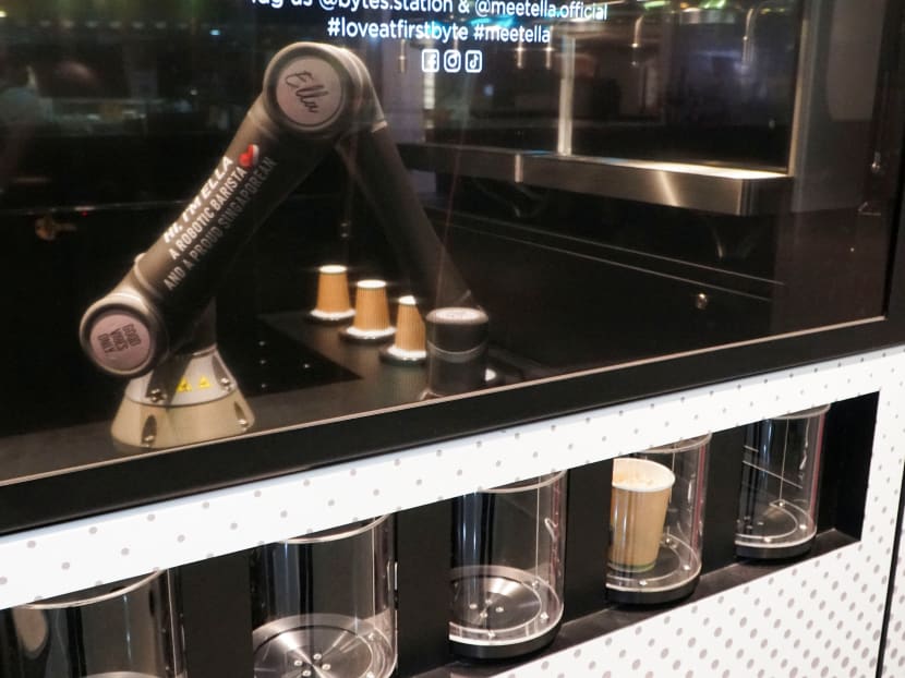 Robot barista "Ella", designed by Crown Digital, makes a coffee autonomously after receiving orders, in Singapore on April 26, 2022. Robot barista "Ella", designed by Crown Digital, makes a coffee autonomously after receiving orders, in Singapore on April 26, 2022.