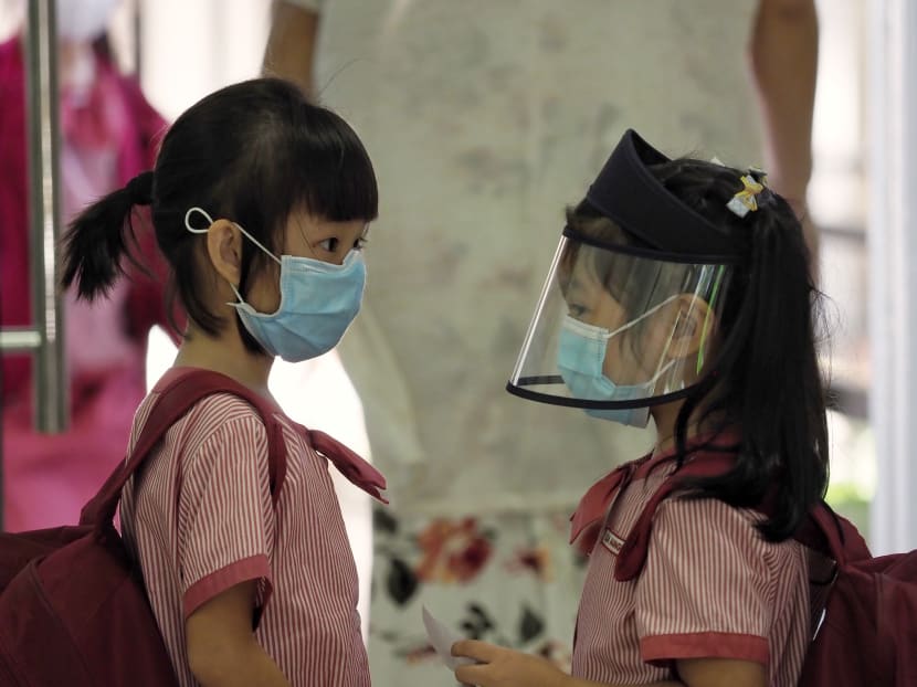 Students from St James Church Kindergarten wearing face masks and shields on June 2, 2020 as they return to school.